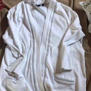 White cardigan with detail down the front